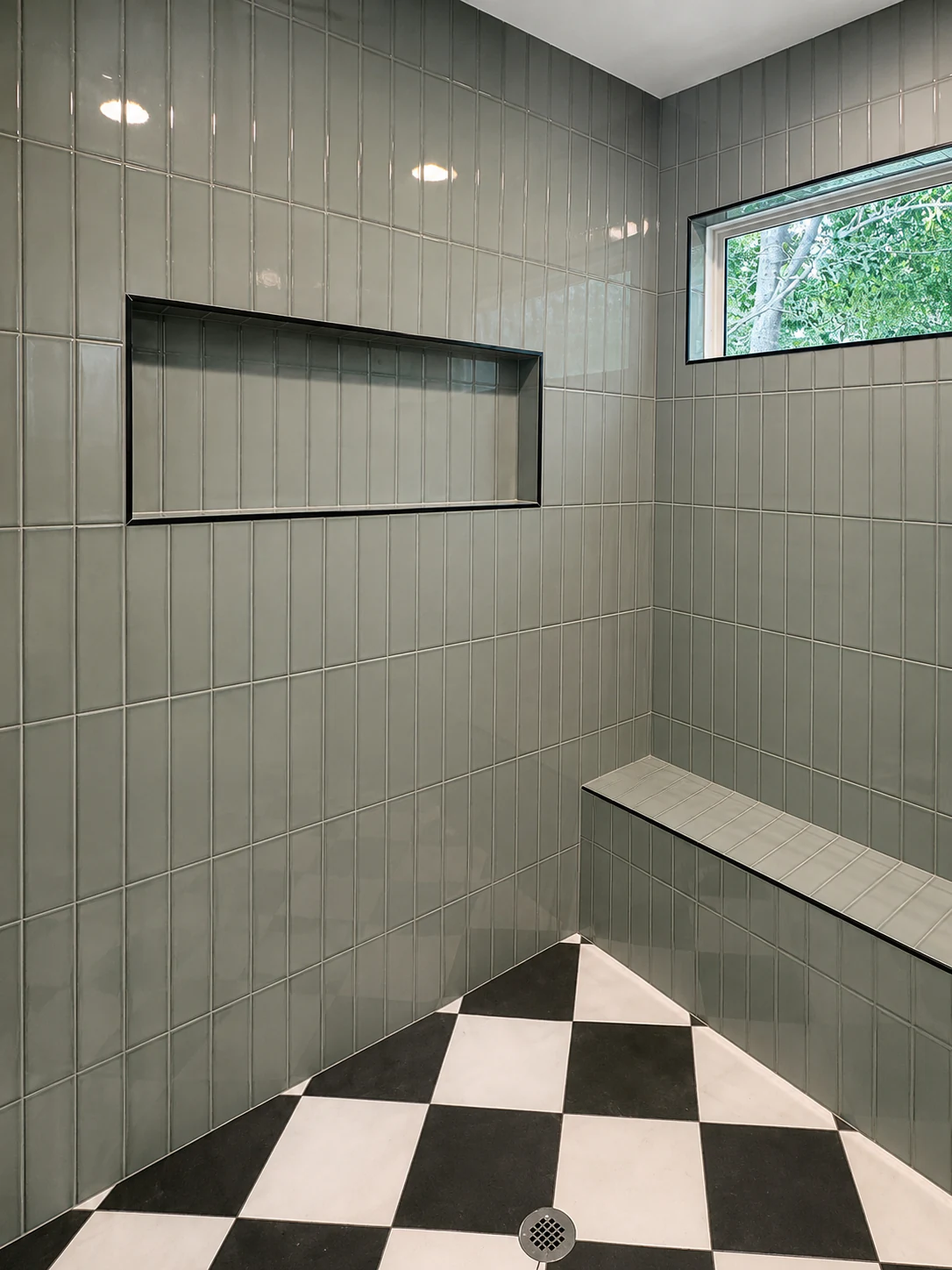 Custom bathroom renovation with green tile in Bluffton, SC